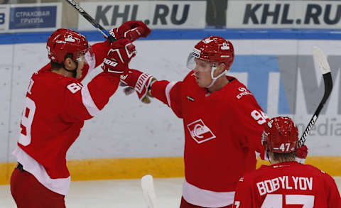 MOSCOW, RUSSIA – OCTOBER 24, 2016: HC Spartak Moscow’s Lukas Radil, Ryan Stoa, and Vladimir Bobylyov (L-R) celebrate Stoa’s goal against HC Torpedo Nizhny Novgorod in their 2016/17 KHL Regular Season ice hockey match at the Luzhniki Stadium. Mikhail Japaridze/TASS (Photo by Mikhail JaparidzeTASS via Getty Images)