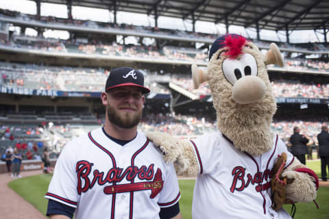 ATLANTA, GA – JUNE 16: A.J. Minter #33 of the Atlanta Braves and Blooper against the San Diego Padres at SunTrust Park on June 16, 2018, in Atlanta, Georgia. The x won x-x. (Photo by Nic Huey/Beam Imagination/Atlanta Braves/Getty Images)