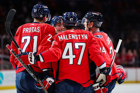 WASHINGTON, DC – OCTOBER 07: John Carlson #74 of the Washington Capitals celebrates with teammates after scoring a goal against the Columbus Blue Jackets during the second period of the NHL preseason game at Capital One Arena on October 7, 2023 in Washington, DC. (Photo by Scott Taetsch/Getty Images)