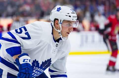 OTTAWA, ON – SEPTEMBER 18: Toronto Maple Leafs defenseman Travis Dermott (57) tracks the puck during second period National Hockey League preseason action between the Toronto Maple Leafs and Ottawa Senators on September 18, 2017, at Canadian Tire Centre in Ottawa, ON, Canada. (Photo by Richard A. Whittaker/Icon Sportswire via Getty Images)