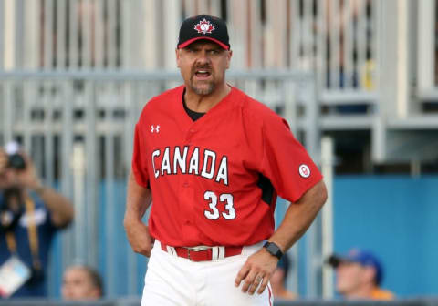 Jul 18, 2015; Toronto, Ontario, CAN; Canada first base coach Larry Walker (33) yells at the baserunner against Puerto Rico during the 2015 Pan Am Games at Ajax Pan Am Ballpark. Canada beat Puerto Rico 7-1 Mandatory Credit: Tom Szczerbowski-USA TODAY Sports. Montreal Expos.