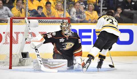 Jan 30, 2016; Nashville, TN, USA; Atlantic Division forward Patrice Bergeron (37) of the Boston Bruins shoots against Pacific Division defenseman John Gibson (36) of the Anaheim Ducks during the 2016 NHL All Star Game Skills Competition at Bridgestone Arena. Mandatory Credit: Christopher Hanewinckel-USA TODAY Sports