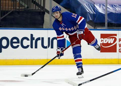 NEW YORK, NEW YORK – JANUARY 16: Julien Gauthier #12 of the New York Rangers skates against the New York Islanders at Madison Square Garden on January 16, 2021 in New York City. The Rangers shutout the Islanders 5-0. (Photo by Bruce Bennett/Getty Images)