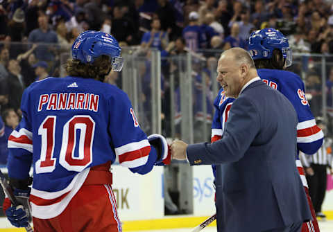 NEW YORK, NEW YORK – MAY 15: Head coach Gerard Gallant of the New York Rangers and Artemi Panarin #10 celebrate a 4-3 overtime victory over the Pittsburgh Penguins in Game Seven of the First Round of the 2022 Stanley Cup Playoffs at Madison Square Garden on May 15, 2022 in New York City. (Photo by Bruce Bennett/Getty Images)