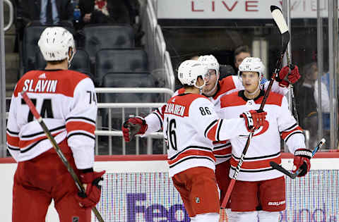 PITTSBURGH, PA – JANUARY 04: Sebastian Aho #20 of the Carolina Hurricanes celebrates with teammates after scoring a goal in the third period during the game against the Pittsburgh Penguins at PPG PAINTS Arena on January 4, 2018 in Pittsburgh, Pennsylvania. (Photo by Justin Berl/Icon Sportswire via Getty Images)