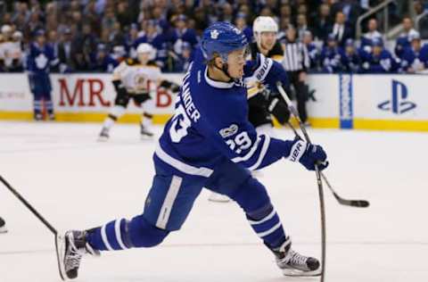 Mar 20, 2017; Toronto, Ontario, CAN; Toronto Maple Leafs forward William Nylander (29) shoots the puck against the Boston Bruins at the Air Canada Centre. Toronto defeated Boston 4-2. Mandatory Credit: John E. Sokolowski-USA TODAY Sports