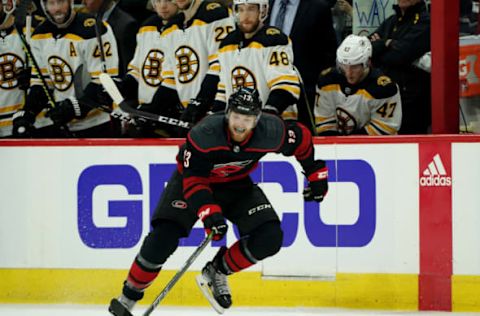 RALEIGH, NC – MAY 16: Warren Foegele #13 of the Carolina Hurricanes skates with the puck in Game Four of the Eastern Conference Third Round against the Boston Bruins during the 2019 NHL Stanley Cup Playoffs on May 16, 2019 at PNC Arena in Raleigh, North Carolina. (Photo by Gregg Forwerck/NHLI via Getty Images)