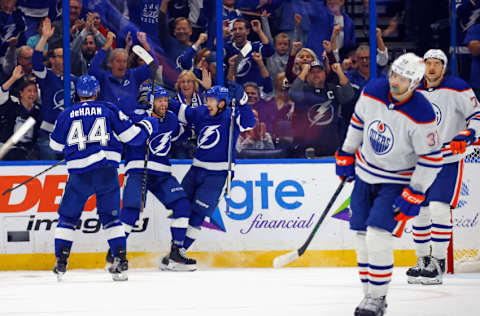 TAMPA, FLORIDA - NOVEMBER 18: Luke Glendening #11 of the Tampa Bay Lightning (C) celebrates his third period goal against the Edmonton Oilers at Amalie Arena on November 18, 2023 in Tampa, Florida. The Lightning defeated the Oilers 6-4. (Photo by Bruce Bennett/Getty Images)