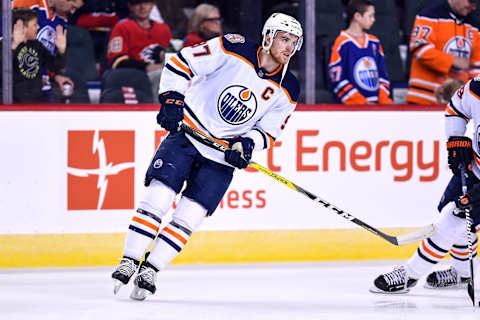 CALGARY, AB – APRIL 06: Edmonton Oilers Center Connor McDavid (97) warms up before an NHL game where the Calgary Flames hosted the Edmonton Oilers on April 6, 2019, at the Scotiabank Saddledome in Calgary, AB. (Photo by Brett Holmes/Icon Sportswire via Getty Images)