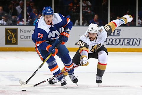 UNIONDALE, NEW YORK – DECEMBER 05: Mathew Barzal #13 of the New York Islanders is pursued by Chandler Stephenson #20 of the Vegas Golden Knights during the first period at NYCB Live’s Nassau Coliseum on December 05, 2019 in Uniondale, New York. (Photo by Mike Stobe/NHLI via Getty Images)