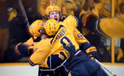 Nashville Predators center Ryan Johansen (92) celebrates with left wing Viktor Arvidsson (38) and left wing Filip Forsberg (9) (Christopher Hanewinckel-USA TODAY Sports)