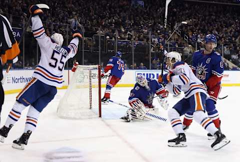 NEW YORK, NEW YORK – NOVEMBER 26: Dylan Holloway #55 of the Edmonton Oilers scores his first NHL goal during the third period against the New York Rangers at Madison Square Garden on November 26, 2022, in New York City. The Oilers defeated the Rangers 4-3. (Photo by Bruce Bennett/Getty Images)