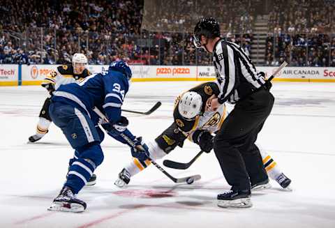 TORONTO, ON – OCTOBER 19: Patrice Bergeron #37 of the Boston Bruins takes a face-off against Auston Matthews #34 of the Toronto Maple Leafs during the second period at the Scotiabank Arena on October 19, 2019 in Toronto, Ontario, Canada. (Photo by Mark Blinch/NHLI via Getty Images)