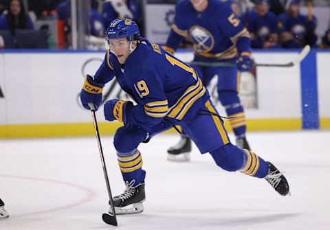 Dec 29, 2021; Buffalo, New York, USA; Buffalo Sabres center Peyton Krebs (19) skates for the puck during the second period against the New Jersey Devils at KeyBank Center. Mandatory Credit: Timothy T. Ludwig-USA TODAY Sports