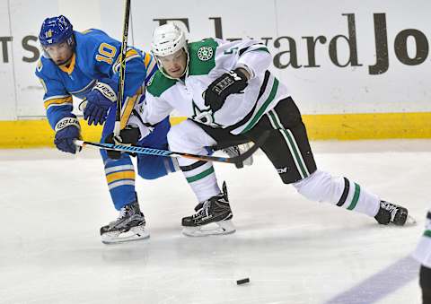 ST. LOUIS, MO – JANUARY 07: St. Louis Blues leftwing Scottie Upshall (10) and Dallas Stars defenseman Jamie Oleksiak (5) go after a loose puck during a NHL game between the Dallas Stars and the St. Louis Blues on January 07, 2017, at Scottrade Center in St. Louis, MO. The Blues beat the Stars, 4-3. (Photo by Keith Gillett/Icon Sportswire via Getty Images)