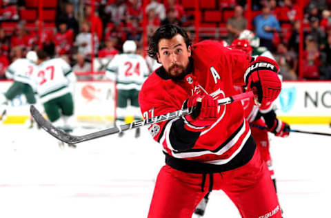 RALEIGH, NC – OCTOBER 7: Justin Faulk #27 of the Carolina Hurricanes shoots the puck during warmups prior to an NHL game against the Minnesota Wild on October 7, 2017 at PNC Arena in Raleigh, North Carolina. (Photo by Gregg Forwerck/NHLI via Getty Images)