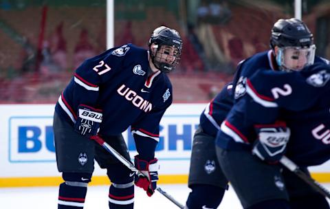 BOSTON, MA – JANUARY 14: Maxim Letunov #27 of the Connecticut Huskies skates against the Maine Black Bears during an NCAA hockey game at Fenway Park during “Frozen Fenway” on January 14, 2017 in Boston, Massachusetts. The Black Bears won 4-0. (Photo by Richard T Gagnon/Getty Images)