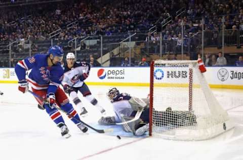 NEW YORK, NEW YORK – MARCH 28: Chris Kreider #20 of the New York Rangers is stopped by Michael Hutchinson #31 of the Columbus Blue Jackets at Madison Square Garden on March 28, 2023 in New York City. (Photo by Bruce Bennett/Getty Images)