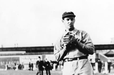 ST. LOUIS – 1905. Charles “Kid” Nichols, pitcher for the St.Louis Cardinals, poses with his equipment bag for a photograph at Sportsmans Park in St. Louis in 1905 . (Photo by Mark Rucker/Transcendental Graphics, Getty Images)