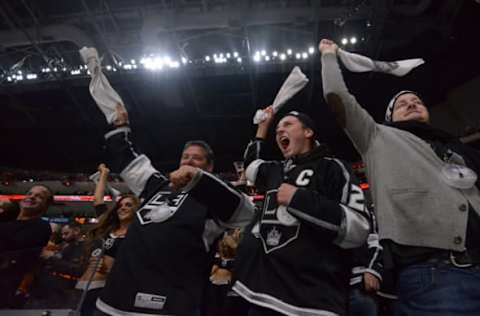 Apr 22, 2016; Los Angeles, CA, USA; Los Angeles Kings fans wave rally towels in game five of the first round of the 2016 Stanley Cup Playoffs against the San Jose Sharks at Staples Center. Mandatory Credit: Kirby Lee-USA TODAY Sports