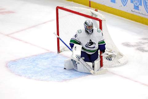 CHICAGO, ILLINOIS – JANUARY 31: Jaroslav Halak #41 of the Vancouver Canucks defends the goal during a game against the Chicago Blackhawks at United Center on January 31, 2022 in Chicago, Illinois. (Photo by Stacy Revere/Getty Images)