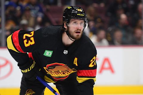 Jan 24, 2023; Vancouver, British Columbia, CAN; Vancouver Canucks defenseman Oliver Ekman-Larsson (23) awaits the start of play against the Chicago Blackhawks during the first period at Rogers Arena. Mandatory Credit: Anne-Marie Sorvin-USA TODAY Sports