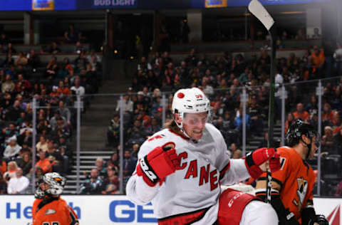 ANAHEIM, CA – OCTOBER 18: Erik Haula #56 of the Carolina Hurricanes celebrates his second period goal against Ryan Miller #30 of the Anaheim Ducks during the game at Honda Center on October 18, 2019 in Anaheim, California. (Photo by Robert Binder/NHLI via Getty Images)