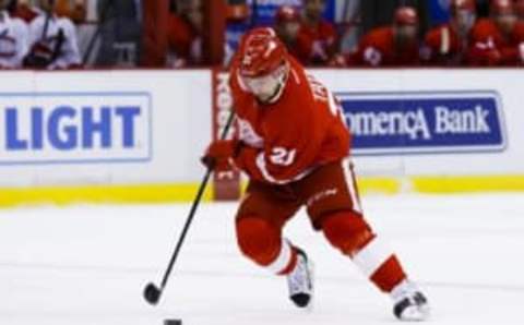 Mar 24, 2016; Detroit, MI, USA; Detroit Red Wings left wing Tomas Tatar (21) skates with the puck in the first period against the Montreal Canadiens at Joe Louis Arena. Mandatory Credit: Rick Osentoski-USA TODAY Sports