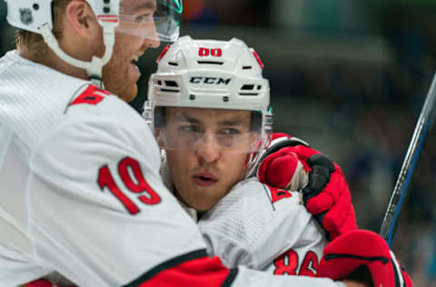 Oct 16, 2019; San Jose, CA, USA; Carolina Hurricanes center Martin Necas (88) and Carolina Hurricanes defenseman Dougie Hamilton (19) celebrate after the goal during the first period against the San Jose Sharks at SAP Center at San Jose. Mandatory Credit: Neville E. Guard-USA TODAY Sports