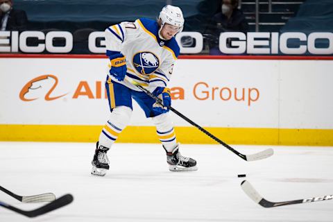 WASHINGTON, DC – APRIL 15: Casey Mittelstadt #37 of the Buffalo Sabres skates with the puck against the Washington Capitals during the third period at Capital One Arena on April 15, 2021 in Washington, DC. (Photo by Scott Taetsch/Getty Images)