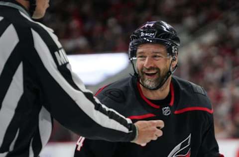 RALEIGH, NC – MAY 03: Carolina Hurricanes right wing Justin Williams (14) laughs after being thrown out of the face-off circle during a game between the Carolina Hurricanes and the New York Islanders on March 3, 2019 at the PNC Arena in Raleigh, NC. (Photo by Greg Thompson/Icon Sportswire via Getty Images)