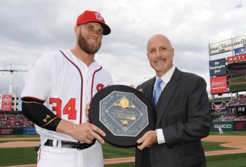 Bryce Harper being presented with the NL MVP Award. Vance won this award in the 1924 season as a part of the Brooklyn Robins.