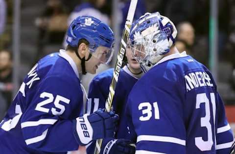 NHL Team Name Origins: Toronto Maple Leafs left wing James van Riemsdyk (25) celebrates their victory with goalie Frederik Andersen (31) against the Nashville Predators at Air Canada Centre. The Maple Leafs defeated the Predators 6-2. Mandatory Credit: Tom Szczerbowski-USA TODAY Sports