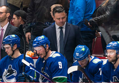 VANCOUVER, BC – NOVEMBER 17: Head coach Travis Green of the Vancouver Canucks reacts after a goal by the Colorado Avalanche during the third period on November 17, 2021 at Rogers Arena in Vancouver, British Columbia, Canada. (Photo by Rich Lam/Getty Images)