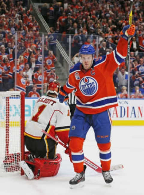 Oct 12, 2016; Edmonton, Alberta, CAN; Edmonton Oilers forward Connor McDavid (97) celebrates a psecond period penalty shot gaol against the Calgary Flames goaltender Brian Elliott (1) at Rogers Place. Mandatory Credit: Perry Nelson-USA TODAY Sports