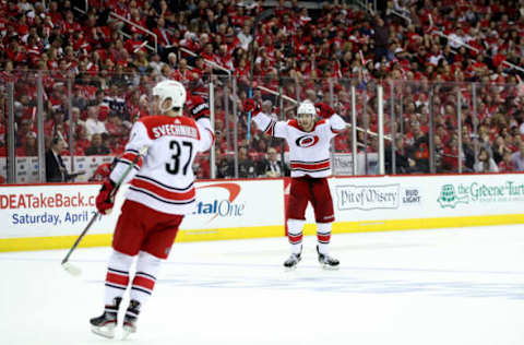 WASHINGTON, DC – APRIL 13: Dougie Hamilton #19 of the Carolina Hurricanes celebrates after the Hurricanes scored in the third period against the Washington Capitals in Game Two of the Eastern Conference First Round during the 2019 NHL Stanley Cup Playoffs at Capital One Arena on April 13, 2019 in Washington, DC. (Photo by Rob Carr/Getty Images)