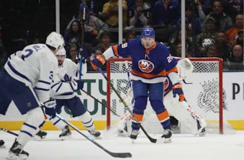 UNIONDALE, NEW YORK – NOVEMBER 13: Michael Dal Colle #28 of the New York Islanders looks to block a second period shot by Justin Holl #3 of the Toronto Maple Leafs at NYCB Live’s Nassau Coliseum on November 13, 2019 in Uniondale, New York. (Photo by Bruce Bennett/Getty Images)