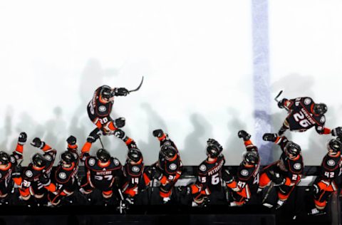 ANAHEIM, CA: Brandon Montour #26 and Jason Chimera #20 of the Anaheim Ducks celebrate Montour’s first period against the Vancouver Canucks on March 14, 2018. (Photo by Debora Robinson/NHLI via Getty Images)