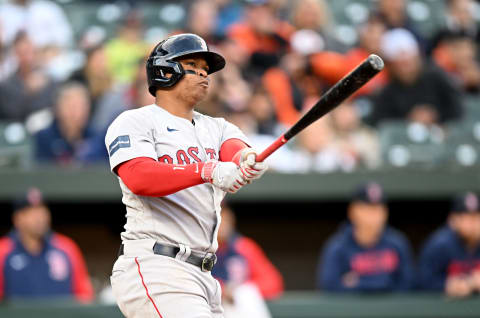 BALTIMORE, MARYLAND – APRIL 24: Rafael Devers #11 of the Boston Red Sox hits a home run against the Baltimore Orioles at Oriole Park at Camden Yards on April 24, 2023 in Baltimore, Maryland. (Photo by G Fiume/Getty Images)