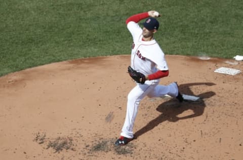 Apr 3, 2017; Boston, MA, USA; Boston Red Sox pitcher Rick Porcello (22) delivers a pitch during the fourth inning against the Pittsburgh Pirates at Fenway Park. Mandatory Credit: Greg M. Cooper-USA TODAY Sports