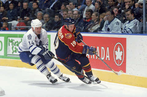 27 Oct 1999: Jonas Hoglund #14 of the Toronto Maple Leafs moves on the ice with Nelson Emerson #19 of the Atlanta Thrashers during the game at the Air Canada Centre in Toronto, Canada. The Maple Leafs defeated the Thrashers 4-0. Mandatory Credit: Robert Laberge /Allsport