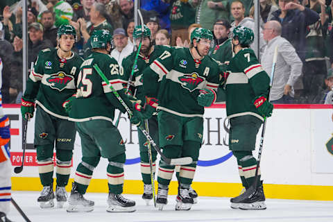 Oct 24, 2023; Saint Paul, Minnesota, USA; Minnesota Wild left wing Marcus Foligno (17) celebrates his goal against the Edmonton Oilers in the third period at Xcel Energy Center. Mandatory Credit: Brad Rempel-USA TODAY Sports