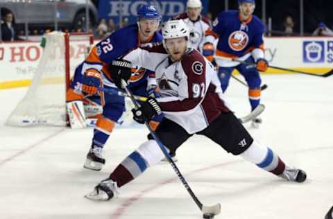 NHL Power Rankings: Colorado Avalanche left wing Gabriel Landeskog (92) plays the puck against New York Islanders left wing Anthony Beauvillier (72) during the third period at Barclays Center. Mandatory Credit: Brad Penner-USA TODAY Sports