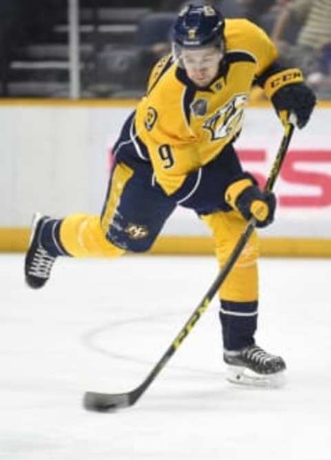 Nashville Predators center Filip Forsberg (9) shoots the puck. Mandatory Credit: Christopher Hanewinckel-USA TODAY Sports