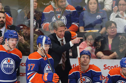 EDMONTON, CANADA - NOVEMBER 15: The Edmonton Oilers new coach Kris Knoblauch giving his players instructions in the second period against the Seattle Kraken at Rogers Place on November 15, 2023 in Edmonton, Alberta, Canada. (Photo by Lawrence Scott/Getty Images)