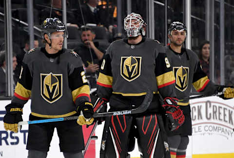 LAS VEGAS, NEVADA – FEBRUARY 26: Nick Cousins #21, Robin Lehner #90 and Alec Martinez #23 of the Vegas Golden Knights warm up before a game against the Edmonton Oilers at T-Mobile Arena on February 26, 2020 in Las Vegas, Nevada. (Photo by Ethan Miller/Getty Images)