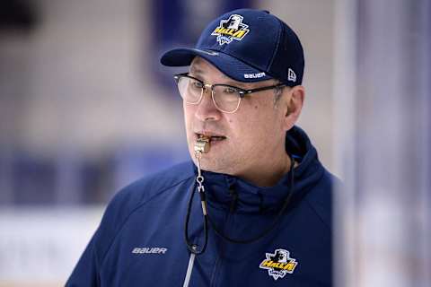 In this picture taken on Jan. 24, 2022, Canadian coach and former international Jim Paek — the first Korea-born NHL player to win the Stanley Cup — who also coached South Korea’s national ice hockey team at the Pyeongchang 2018 Winter Olympic Games, takes part in a practice session with his Anyang Halla teammates in Anyang. – As 2018 hosts, South Korea dreamed of Olympic ice hockey glory, importing a star coach and roster of players. Four years later, not only did they fail to qualify for this week’s Beijing Games — most of their players quit the sport. – TO GO WITH Oly-2018-2022-KOR-ihockey, FOCUS by Sunghee Hwang (Photo by Anthony WALLACE / AFP) / TO GO WITH Oly-2018-2022-KOR-ihockey, FOCUS by Sunghee Hwang (Photo by ANTHONY WALLACE/AFP via Getty Images)