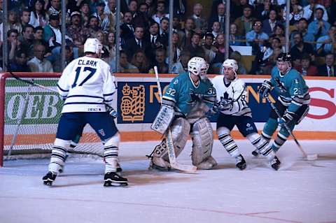 TORONTO, ON – MAY 2: Arturs Irbe #32 and Vlastimil Kroupa #26 of the San Jose Sharks skate against Wendel Clark #17 and Doug Gilmour #93 of the Toronto Maple Leaf (Photo by Graig Abel/Getty Images)