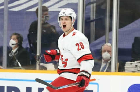 NASHVILLE, TENNESSEE – MAY 21: Sebastian Aho #20 of the Carolina Hurricanes celebrates after scoring a goal in the first period against the Nashville Predators in Game Three of the First Round of the 2021 Stanley Cup Playoffs at Bridgestone Arena on May 21, 2021, in Nashville, Tennessee. (Photo by Andy Lyons/Getty Images)