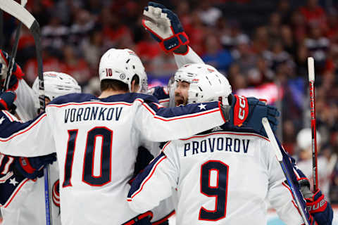 Nov 4, 2023; Washington, District of Columbia, USA; Columbus Blue Jackets left wing Dmitri Voronkov (10) celebrates with teammates after scoring a goal against the Washington Capitals in the second period at Capital One Arena. Mandatory Credit: Geoff Burke-USA TODAY Sports